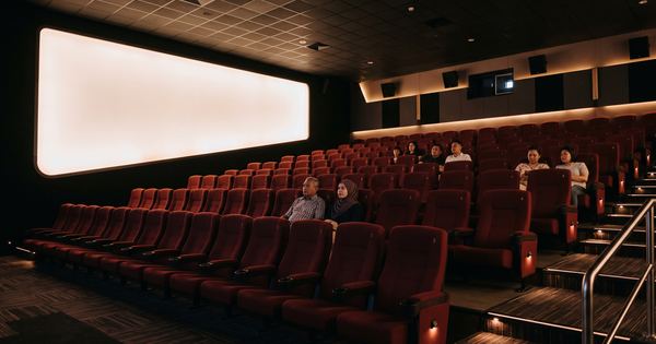 Cinema seats facing a lit screen in a Kota Kinabalu multiplex