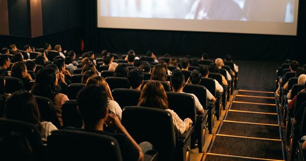 Cinema seats facing a lit screen in a Kota Kinabalu multiplex